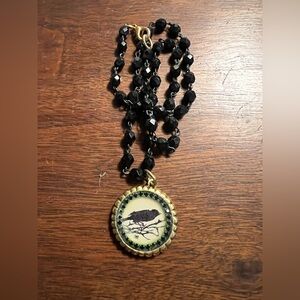 John Wind Maximal Art Raven Necklace Black Beaded Chain Gold Tone Pendant 18in